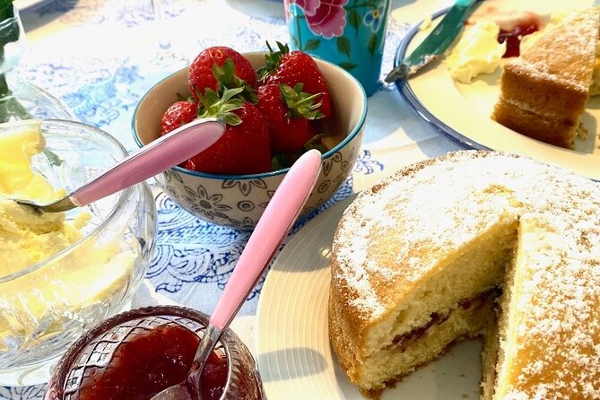 A Fun Afternoon of Baking Scones and Afternoon Tea - What’s on the table: scones, clotted cream, jam, and homemade cake