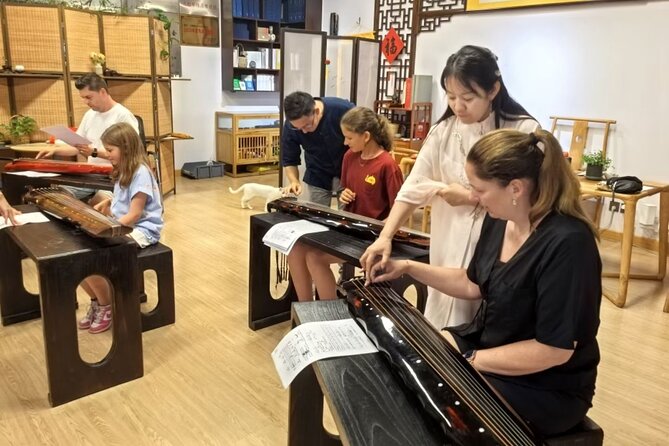 Beijing Culture: Tea Ceremony, Heritage Instrument & Calligraphy - Entering the experience at 813 Creative Park (not a tourist theatre)