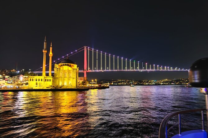 Bosphorus Night Lights: Guided Cruise With Tea and Cookies - Asian-side highlights: Kuleli and Beylerbeyi Palace