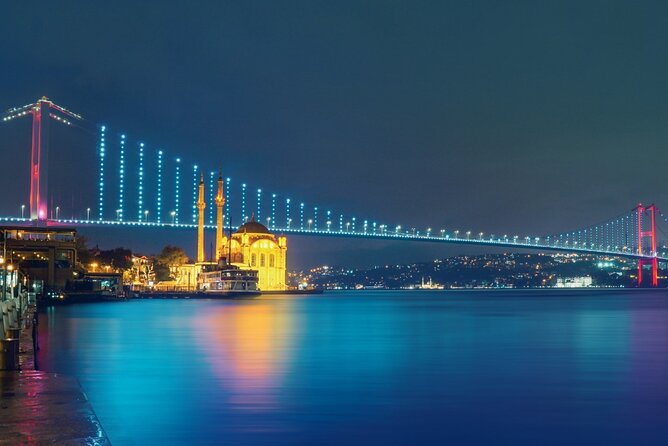 Bosphorus Night Lights: Guided Cruise With Tea and Cookies - Ortaköy Mosque and the Bosphorus “turn” toward fortresses