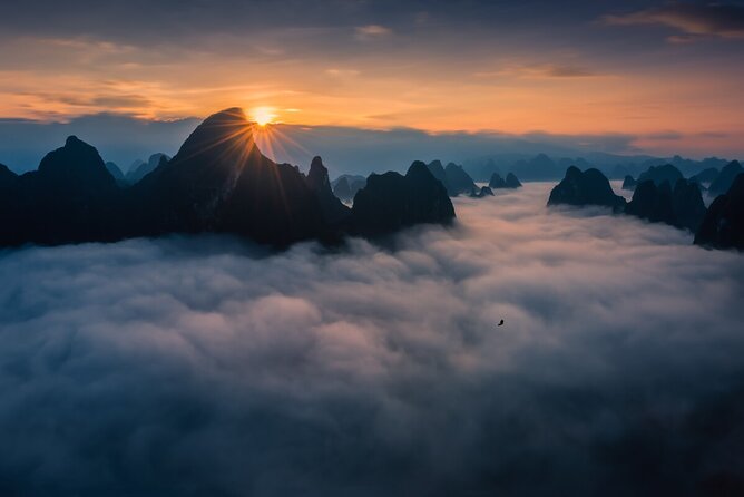 Full-day Tour: Spectacular Sunrise, Tea Plantation & Sunset - Li River tea time: reed hats, picking leaves, and a real tea service