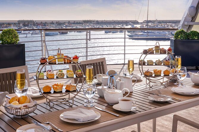 Heritage Tour and Afternoon Tea at Queen Elizabeth 2 Dubai - Cunard vs Britannia Tea: cold bites only, or hot-and-cold canapés too