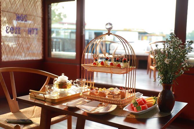 Huong River Afternoon Tea Cruise Tour Along Hue City - Trường Tiền Bridge, Quốc Học High School, and Riverfront Monuments