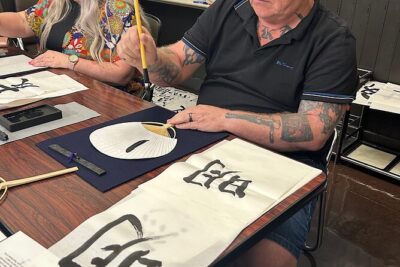 Japanese Calligraphy Class in Yokohama with Tea and Sweets - Choosing Your Kanji: From Model Worksheet to Your Own Uchiwa Fan