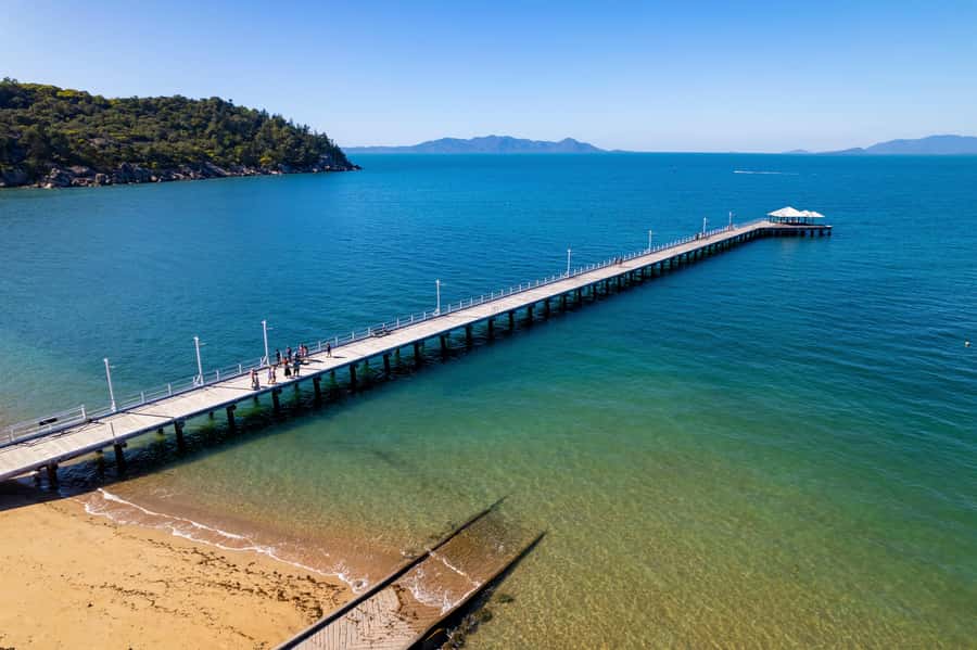 Magnetic Island: Guided Bus Tour with Morning Tea - Picnic Bay Foreshore: morning tea, jetty views, and museum time