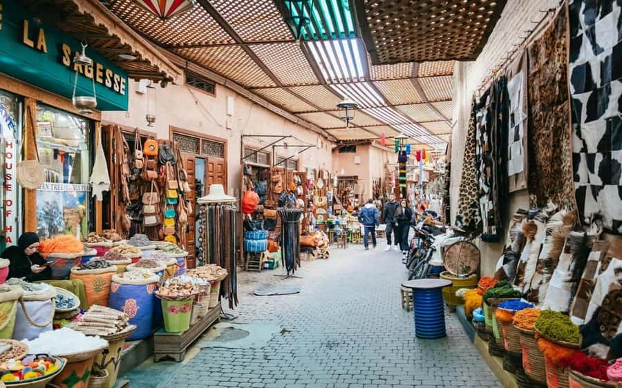 Marrakech Highlights: Guided City Tour With Local Guide - Souks and Artisan Workshops: How Leather, Metal, Spice, and Weaving Show Up