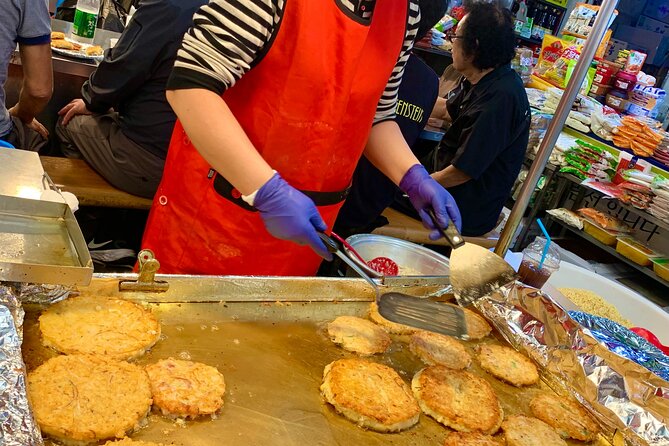 Private Full-Day Guided Tour in Seoul with Lunch, Tea and Dinner - Kwangjang Market: Where Lunch, Snacks, and Dinner Turn Into One Big Plan