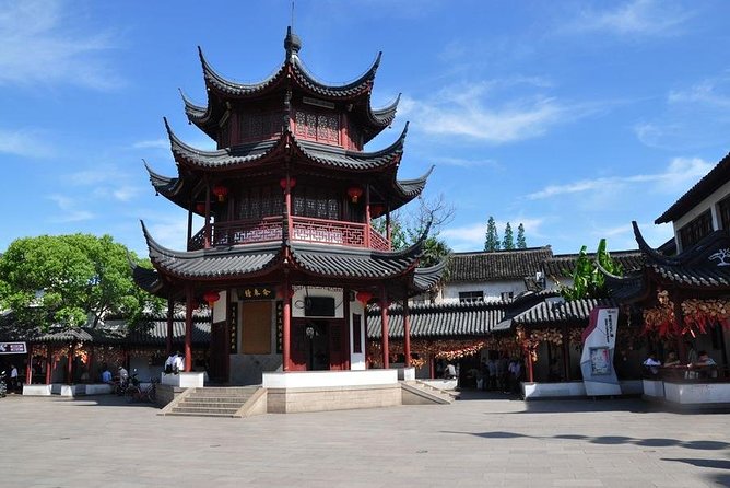 Private Qibao Ancient Town Walking Tour with Tea Tasting and Calligraphy Experience - Stop 1: Shanghai Qibao Town Alleys and Riverside Architecture
