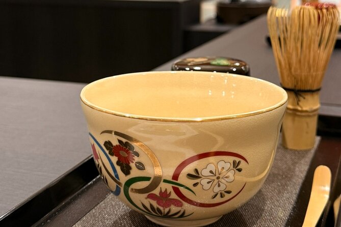 Tea and Calligraphy Session at a Table in Osaka - Getting Oriented at Shinsaibashi ARTY Inn (and Why the Location Helps)