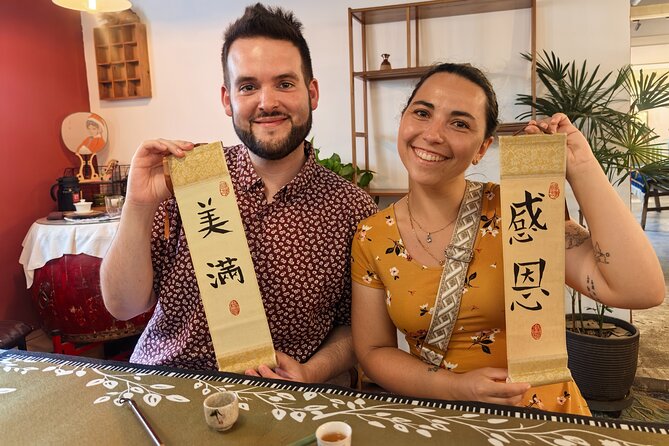 Xi'an Calligraphy & Tea Ceremony - Dive into Ink & Brush Artistry - Make Three Take-Home Artworks: Fan, Bookmarks, and Scroll Painting