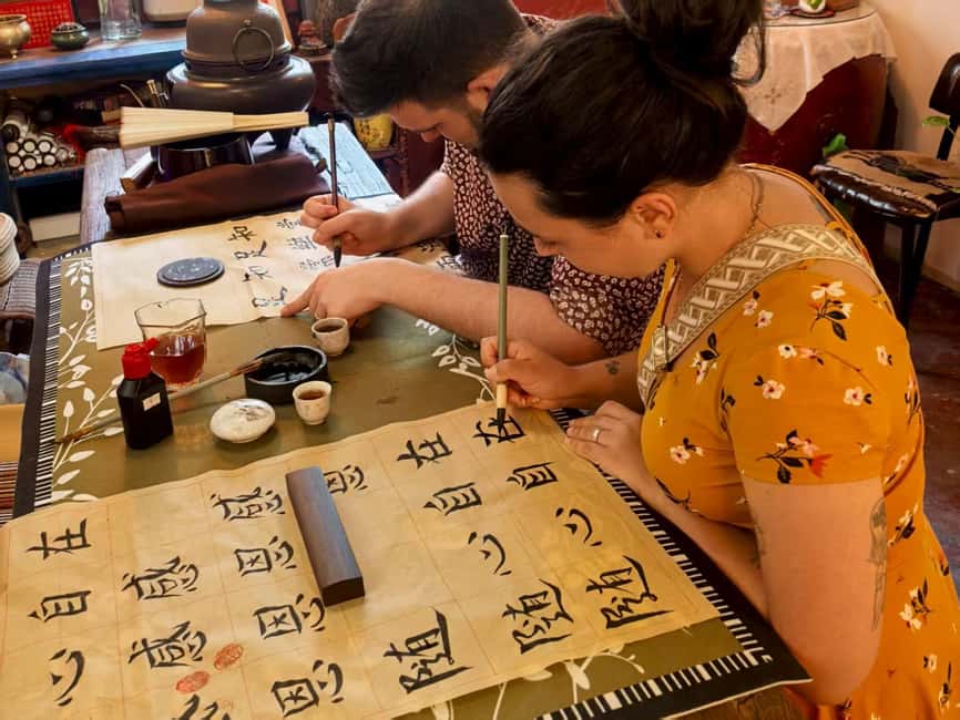 Xi'an Chinese Calligraphy Workshop: Ink Art & Tea Tasting - Your hands-on session: from practice lines to writing your name
